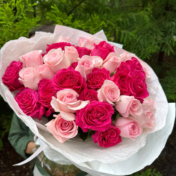 Mixed Pink Roses Bouquet. The photo shows a medium size.
